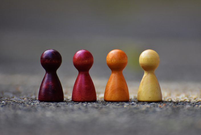 focus-photo-of-4-wooden-pawn-figurine-209728
